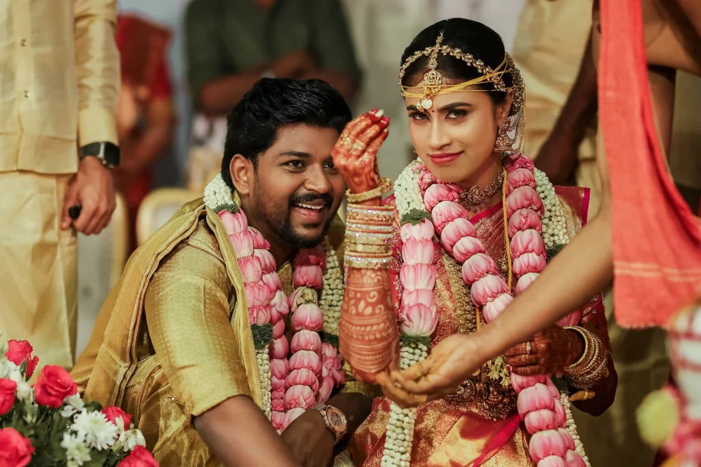 A happy Tamil couple at their wedding, symbolizing successful thirumana porutham matching